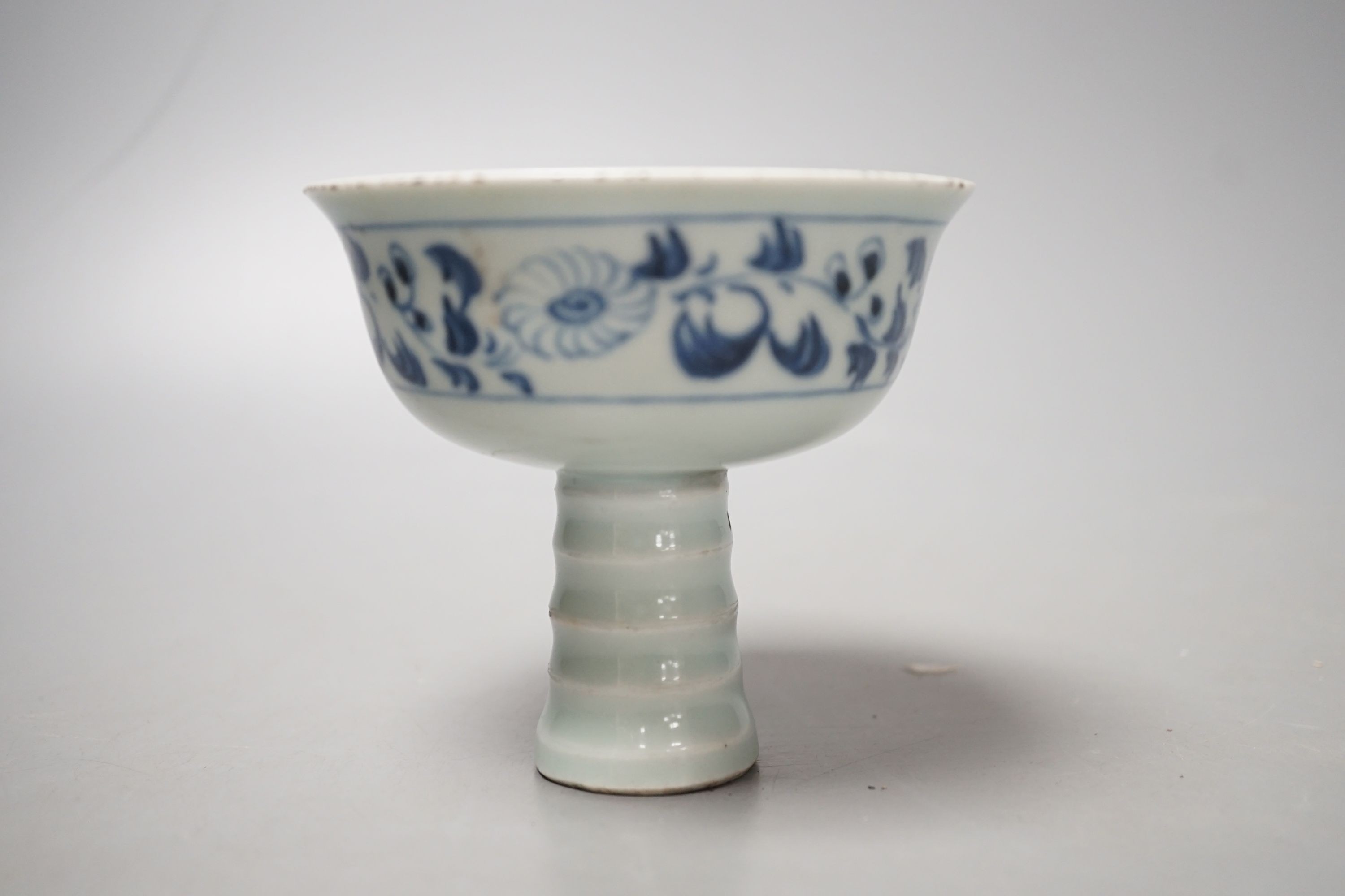 A Chinese blue and white stem cup, Ming Dynasty or later. Height 9cm